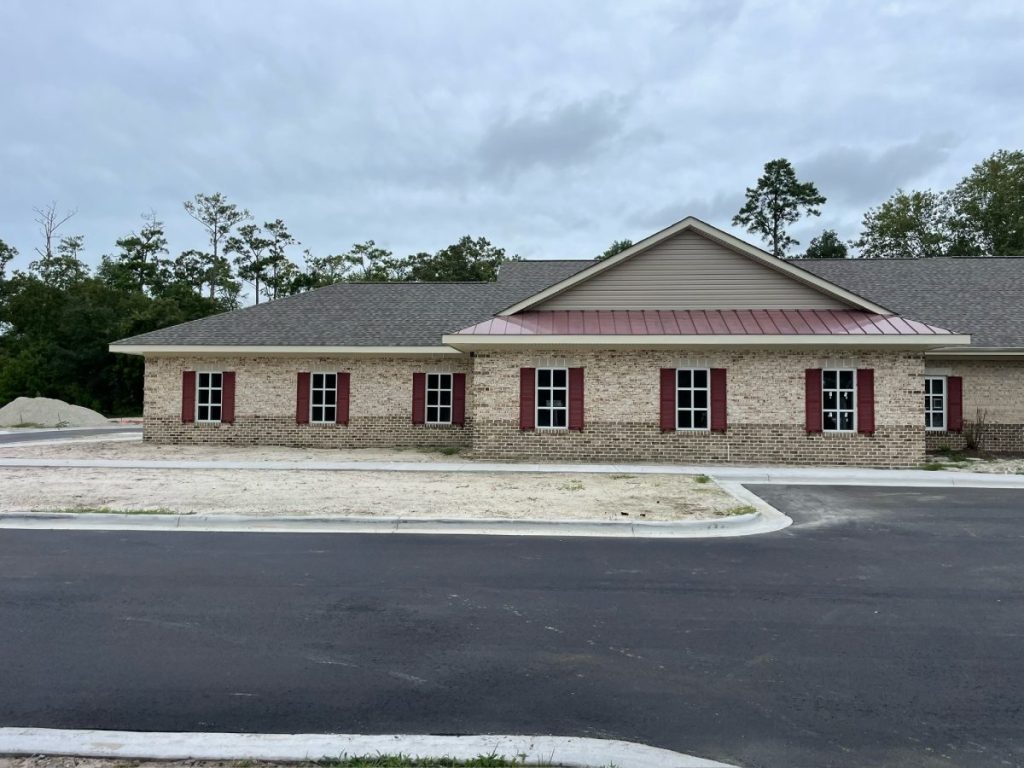 Single-storey brick office building from the road
