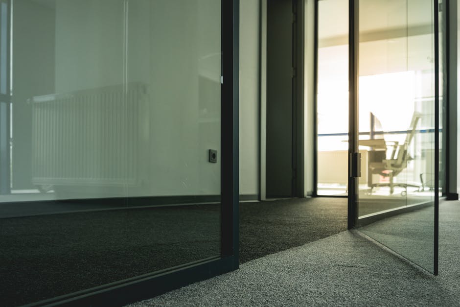 Frameless glass partitions and doors