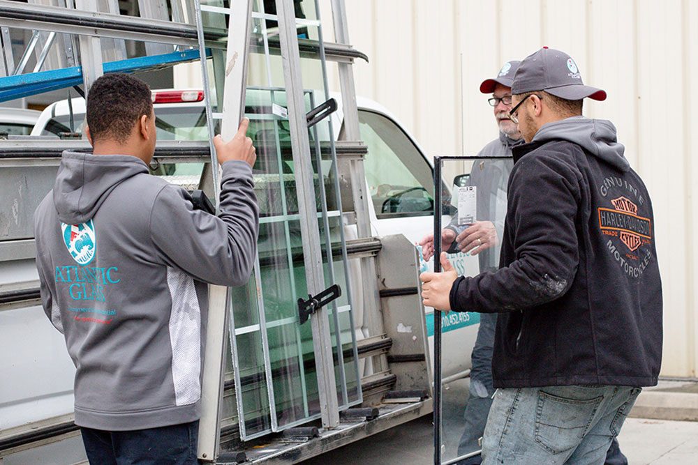 Atlantic Glass technicians installing glass on site
